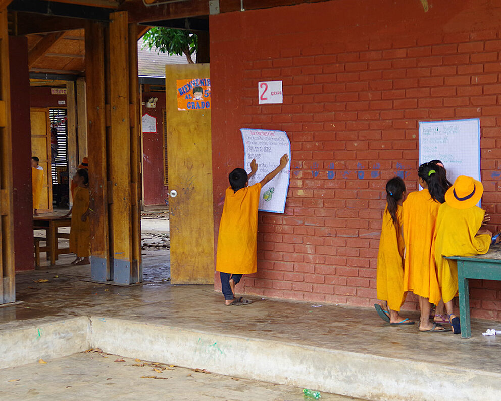 Students prepare for a lesson at a school in Peru