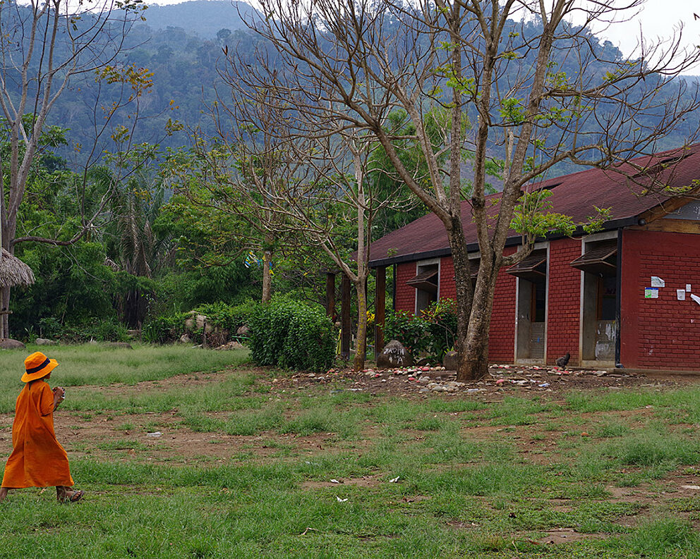 A student walks to one the new schools in Peru