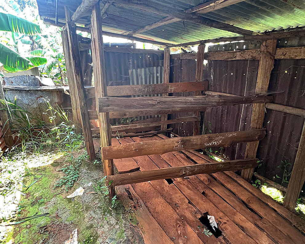 Latrine needing renovations, Uganda